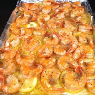 SHRIMP…Melt a stick of butter in the pan. Slice one lemon and layer it on top