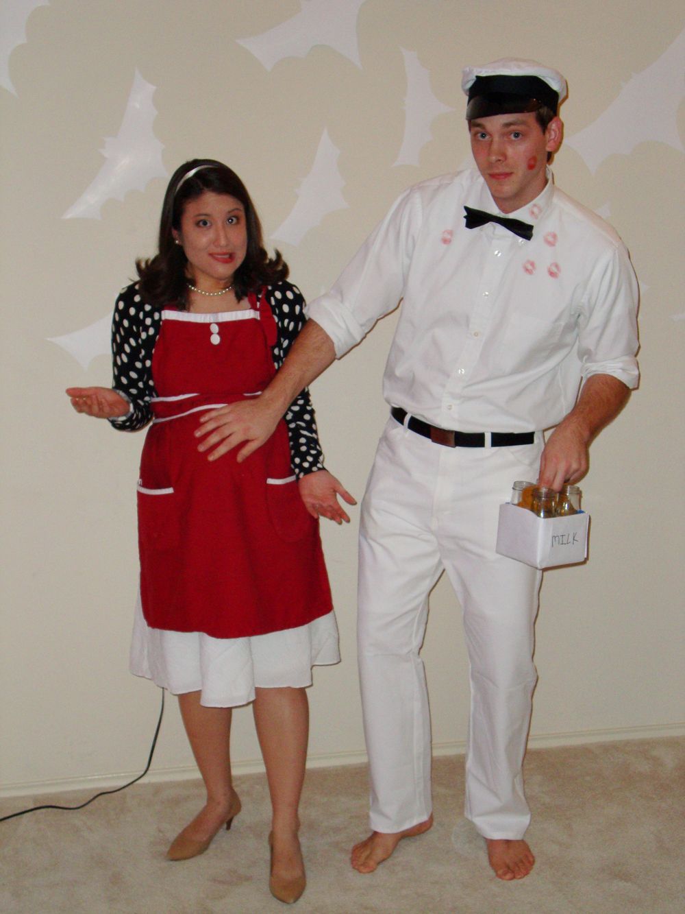 Milk man and 50s pregnant lady costume.  Too funny