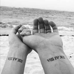 Roman numerals tattoos of your wedding date.
