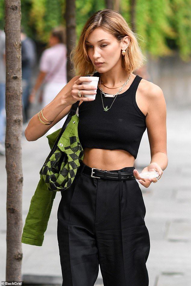 Bella Hadid flashes her toned tummy in a crop top in Milan - Bella Hadid flashes her toned tummy in a crop top in Milan -   14 beauty Fashion style ideas