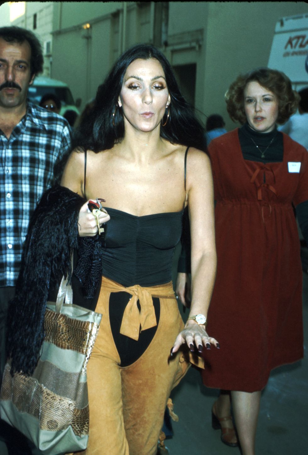 Cher's Best Outfits and Fashion Moments Over The Years - Cher Photos and Style Evolution - Cher's Best Outfits and Fashion Moments Over The Years - Cher Photos and Style Evolution -   13 cher fashion style Icons ideas