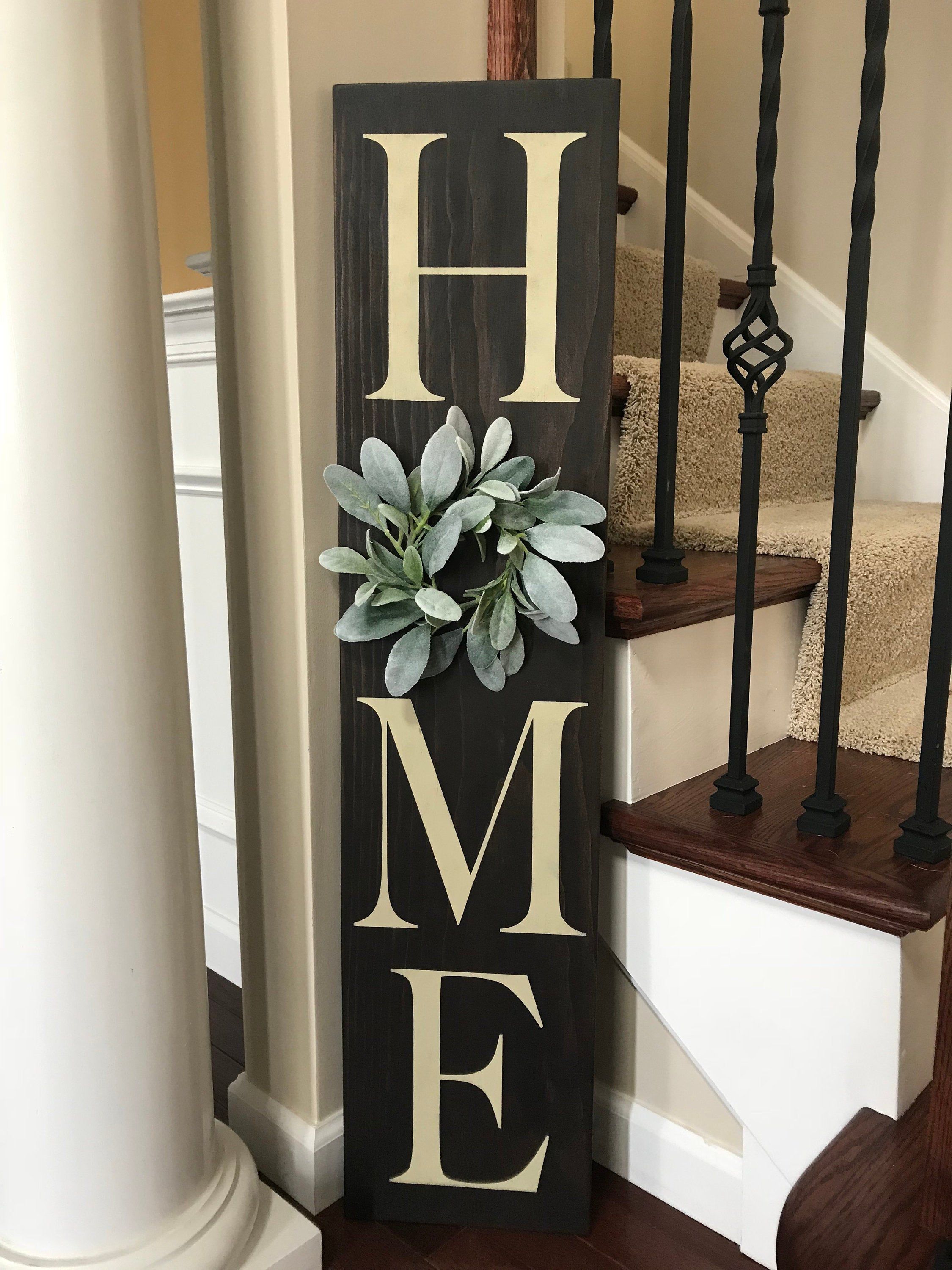 Home sign with wreath, 9
