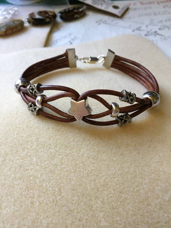 This bracelet is made of leather strap and silver beads with a clasp. - This bracelet is made of leather strap and silver beads with a clasp. -   12 diy Bracelets clasp ideas