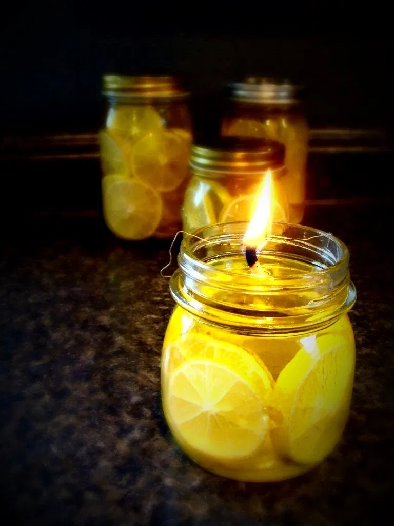 Lemon-filled Olive Oil Lanterns - Lemon-filled Olive Oil Lanterns -   13 diy Candles orange ideas