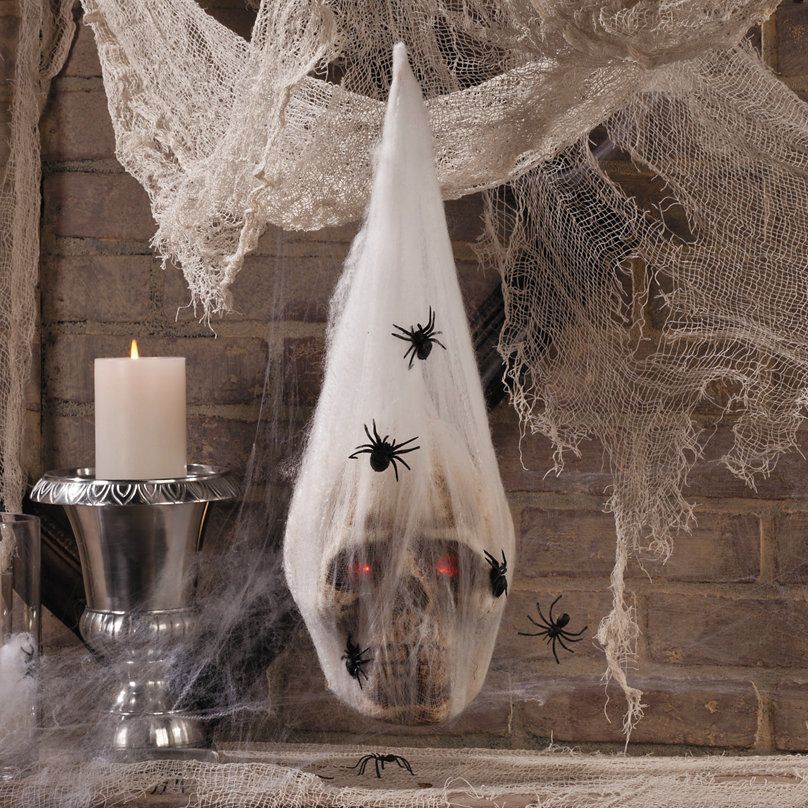 LED Skull in Spider Cocoon Halloween Decoration - LED Skull in Spider Cocoon Halloween Decoration -   19 diy Decorations halloween ideas